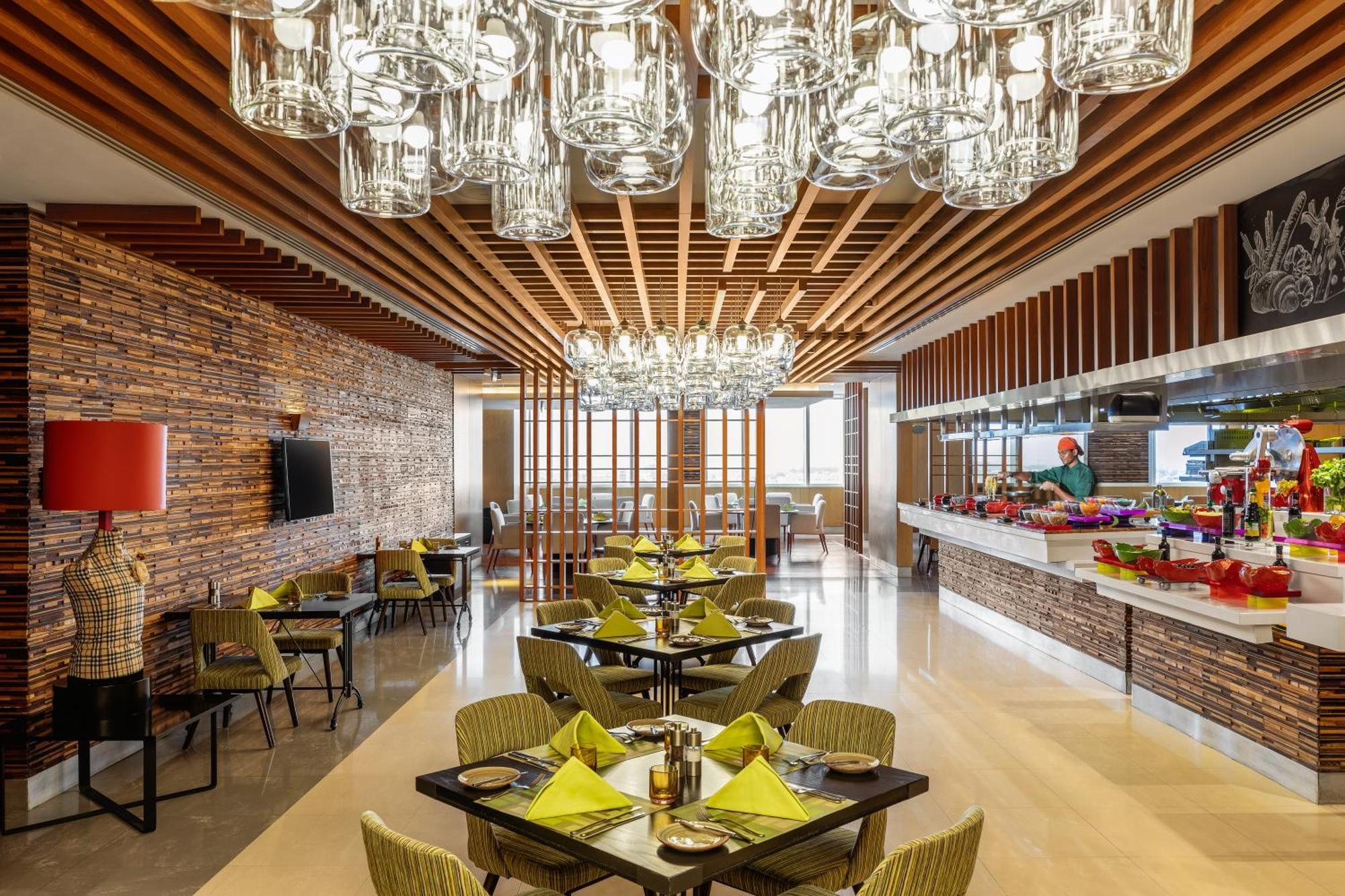 V Hotel Dubai, Curio Collection By Hilton Eksteriør bilde The restaurant